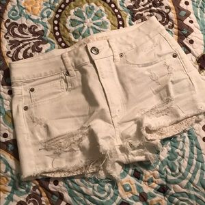American Eagle Hi Rise Distressed White Shorts
